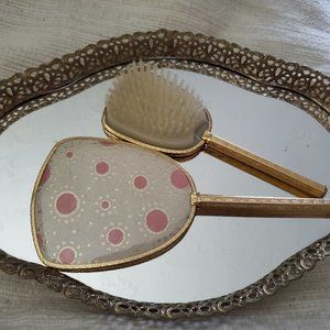 Vintage mirror and brush